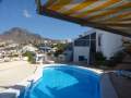 Ferienhaus mit Pool und Meerblick